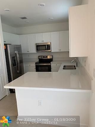 4th image of 5483 NW 27th Ct