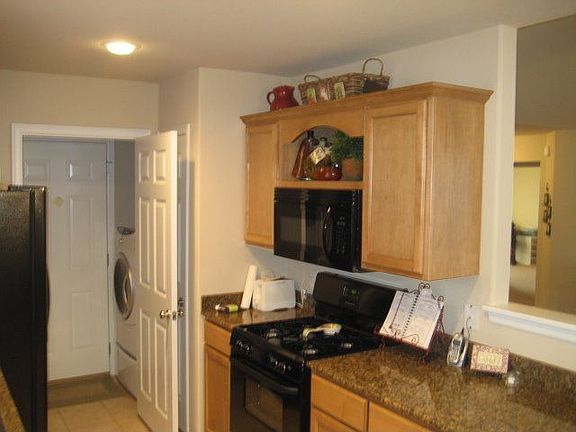 Included appliances are stove, mircrowave range hood, dishwasher and disposal.