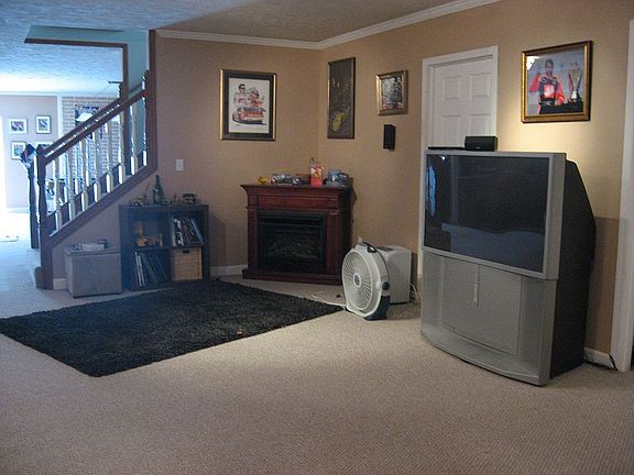 Fireplace in basement, bright and open from walk-out