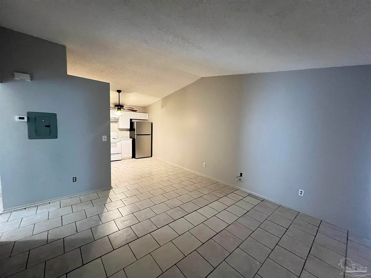 Building Photo - 6809 Tiki Ln #2
