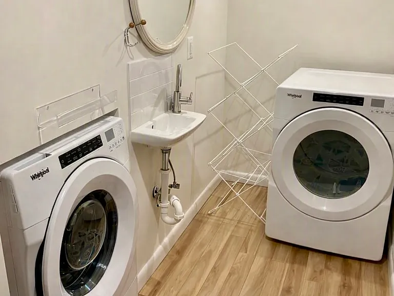 Laundry room and sink in basement
