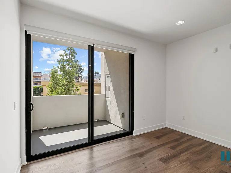 Living Room with Patio with Built-In Shade