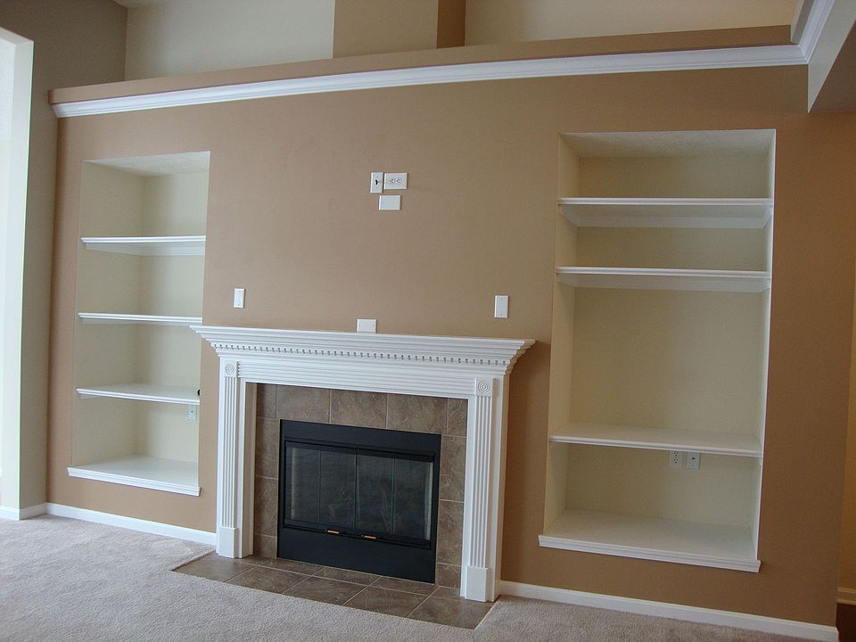 Shelving surround fireplace