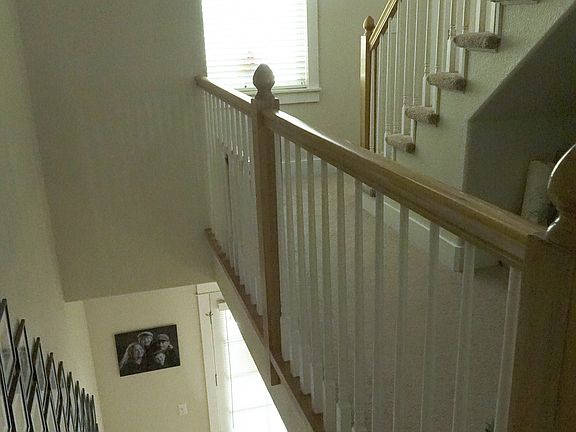 Stairs down to front door
