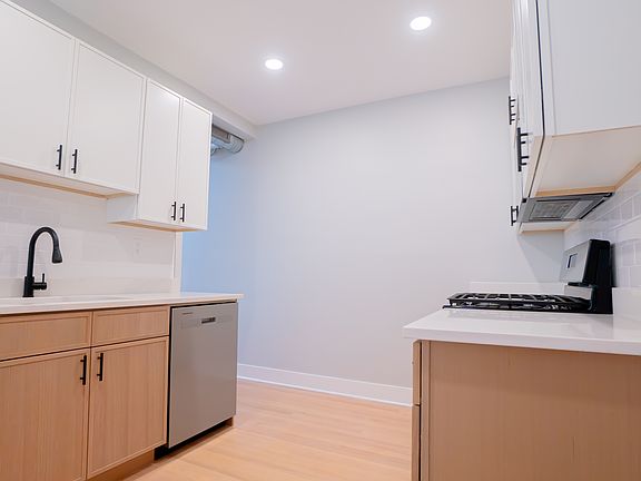 kitchen area with brand new appliances