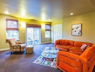 Living room with door to balcony