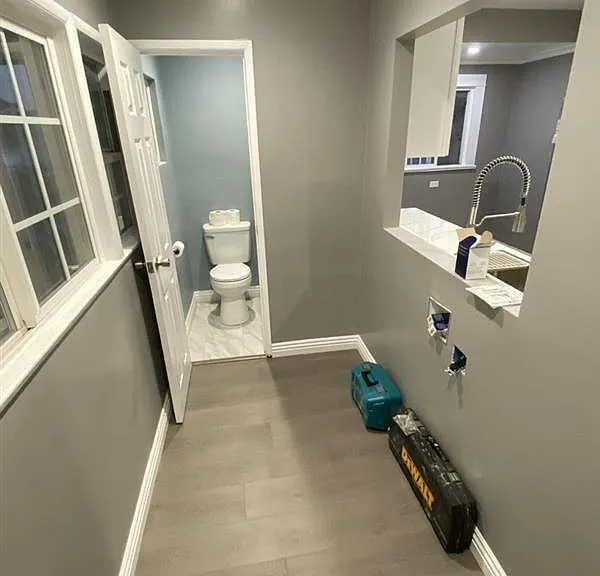1/2 Bath & Laundry Area