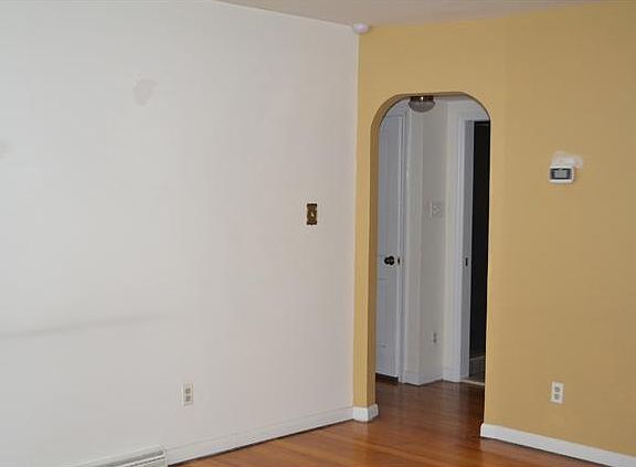 Living Room with Arched Doorway
