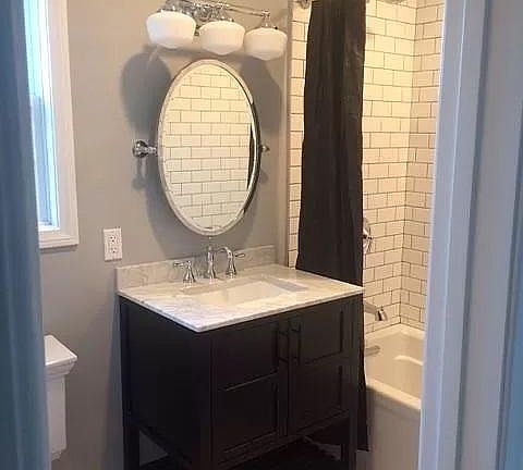 Bathroom with Carrara marble counter top