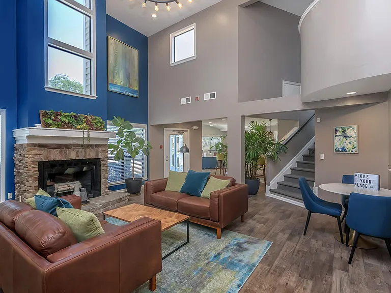 Leasing Office featuring a Cozy Fireplace and Modern Lounge Seating