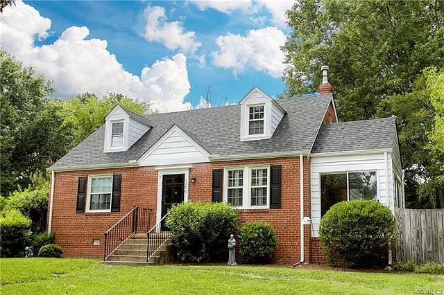 Lovely Cape Cod resting on a large level lot