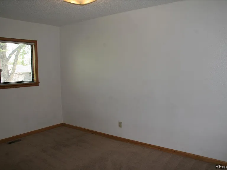 11095 E Kentucky Ave — Photo 4