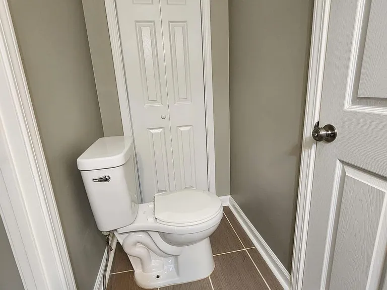 Half Bath Toilet and Linen Closet