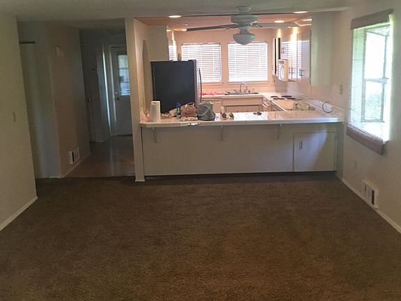 Family room looking back to kitchen