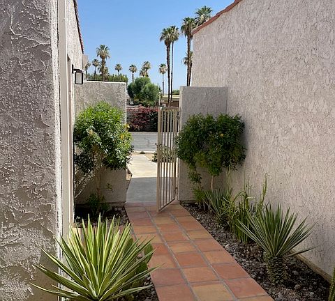 FRONT ENTRY PATIO- View facing North - OPEN BLUE SKY VIEW and Palm Trees