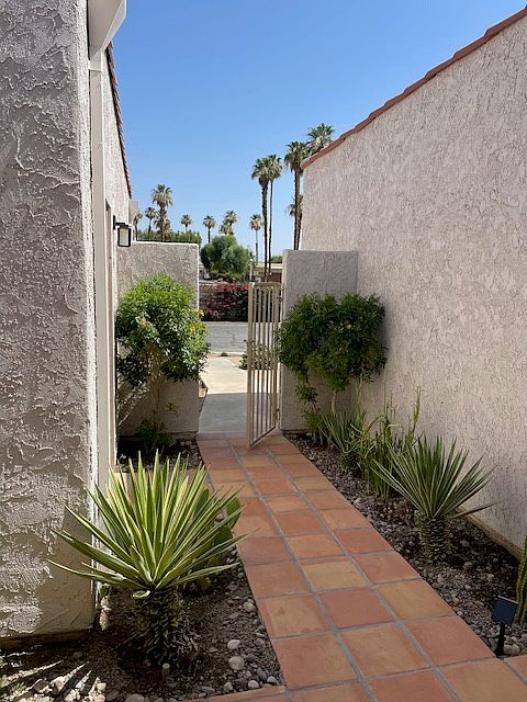 FRONT ENTRY PATIO- View facing North - OPEN BLUE SKY VIEW and Palm Trees