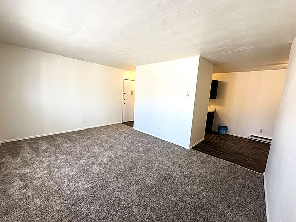 Two Bedroom Spacious Living Room with Separate Dining Area