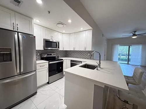 5860 W Sample Rd #202 Photo 1