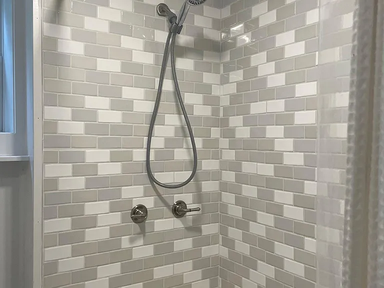 Tiled shower tub.