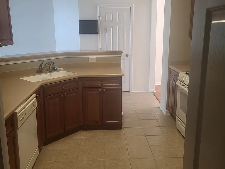 Kitchen with wall mounted flat screen TV
