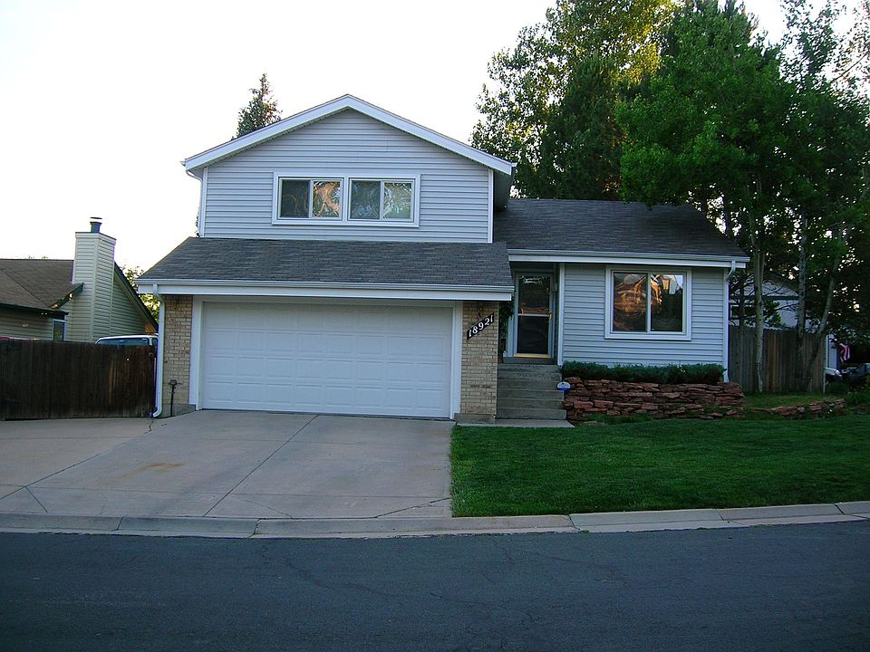 Front of house with RV parking