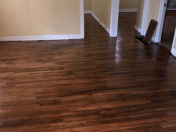 Large parlor leads to two bedrooms