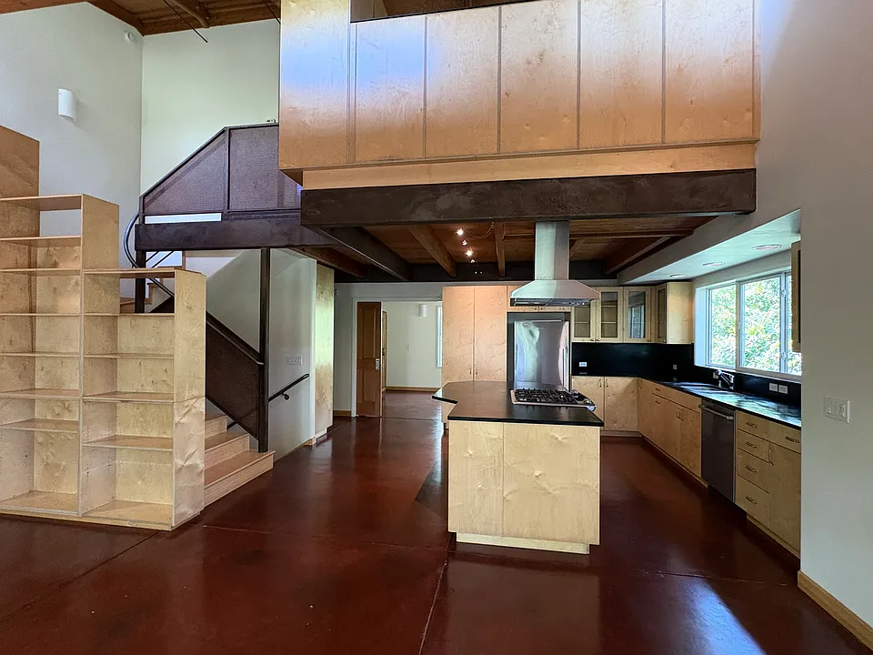 open kitchen, living area showing stairs to upstairs 2nd bedroom and bathroom