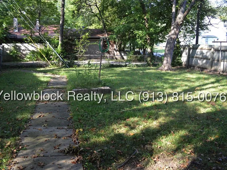 320 E 79th Ter — Photo 15