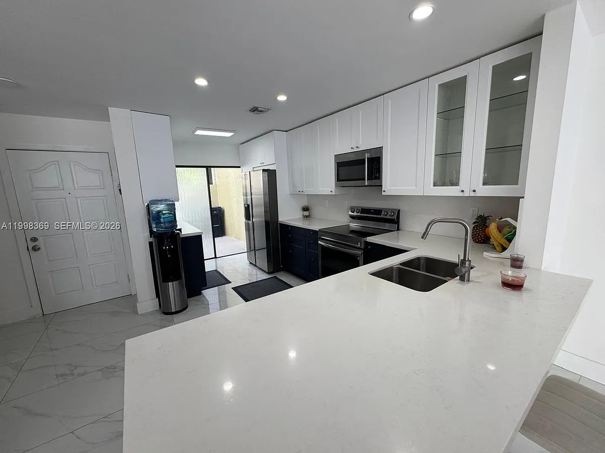 Building Photo - 9729 Costa Del Sol Blvd #33178-C-101