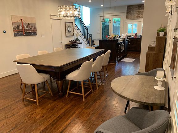 Dining table converts to pool table. Optional to stay with rental.