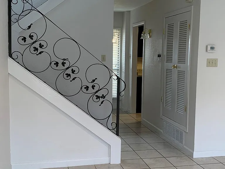 Stairway to 2nd floor & Main entrance Hallway from Family Room View