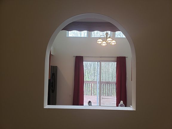 Window between living room and kitchen.