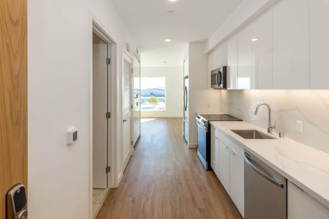 Studio Kitchen with Hard Surface Flooring