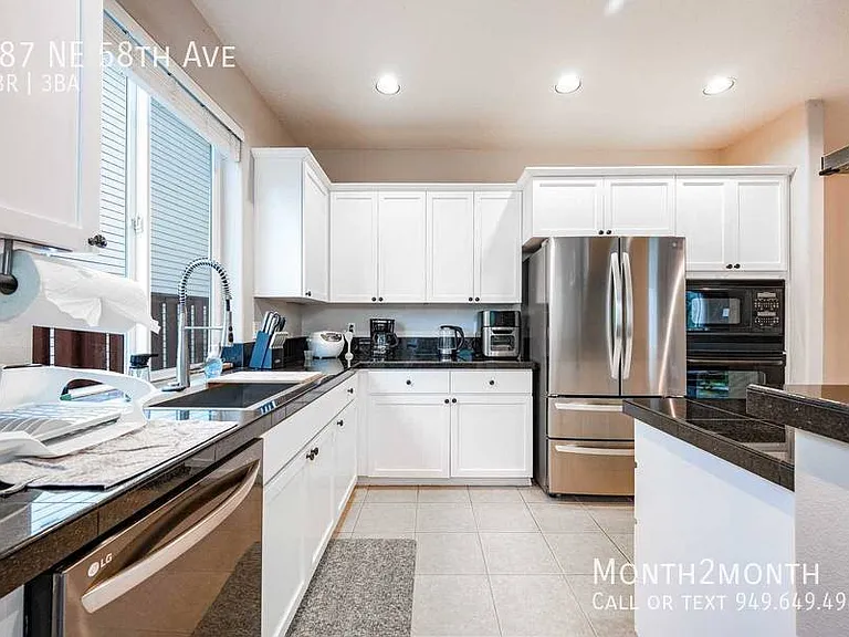 487 NE 58th Ave — Photo 8