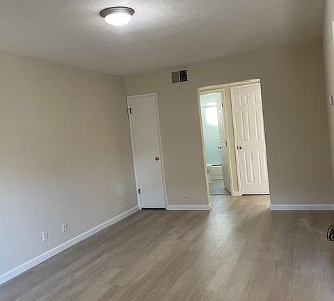 Living room has Gas Furnace.