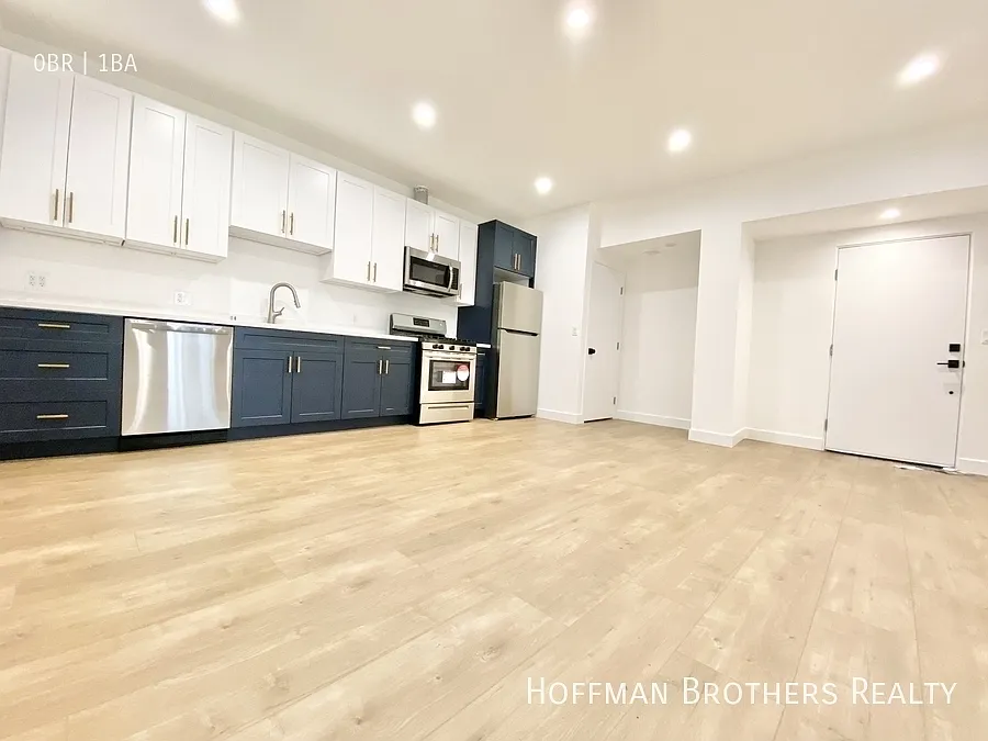 Building Photo - 6712 Willoughby Ave #1/2
