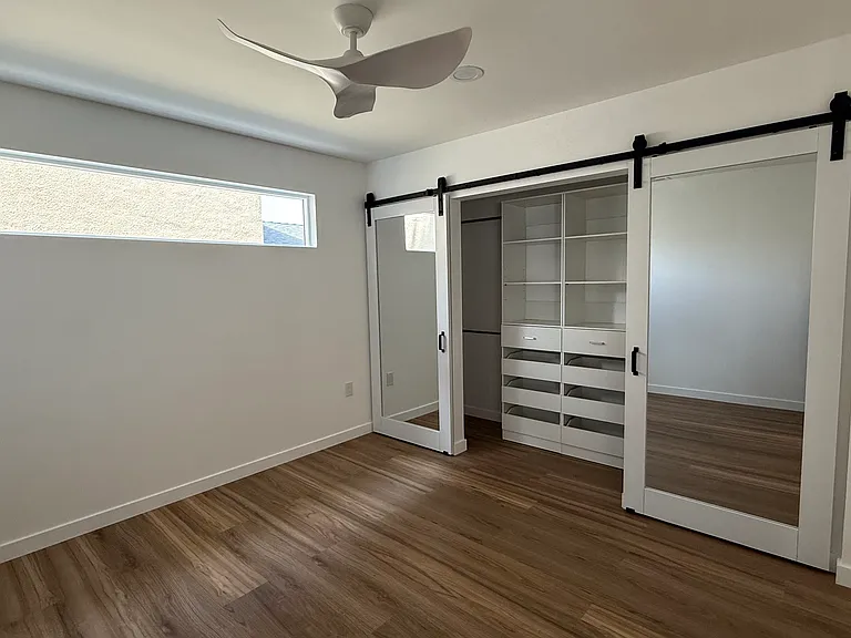 Bedroom with Walk-in Closet & Built-in Storage
