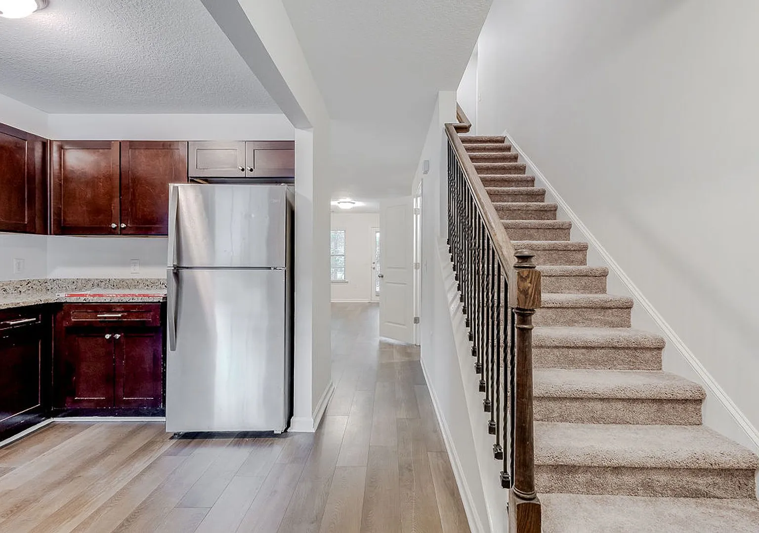 Spacious 3BR Townhome with Main-Level Primary Suite — Photo 2