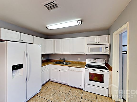 5th image of 120 NE 23rd Ct