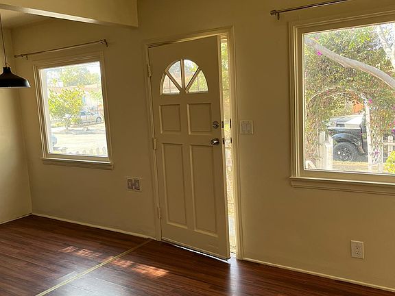 The dining area window on the left and the living room is on the right. All of this facing the little front yard and plenty of sunlight!