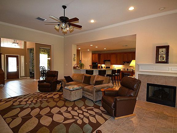 Enjoy high ceilings and the fireplace