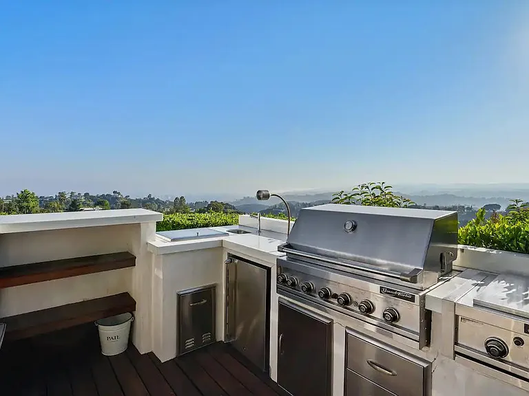 A barbecue station with a view! Savor delectable meals while soaking in the stunning vistas around you.