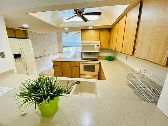 5th image of 9520 Seagrape Dr APT 401
