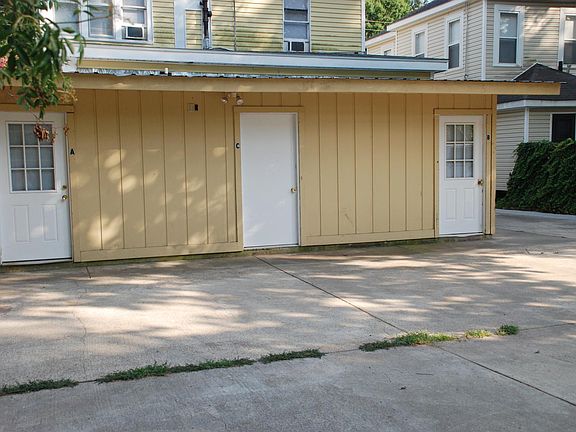 Parking and utility rooms in rear of building