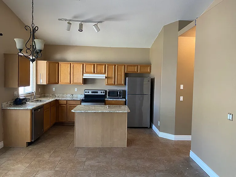 View of kitchen and dining area from great room.