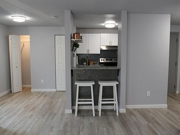 Plenty of room for dining room table! See the entire living room while in the kitchen.