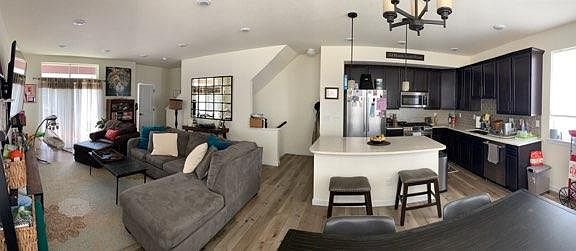 Pano view of 1st floor. Family room on left. Kitchen on right. Great space for entertaining with open floor plan.