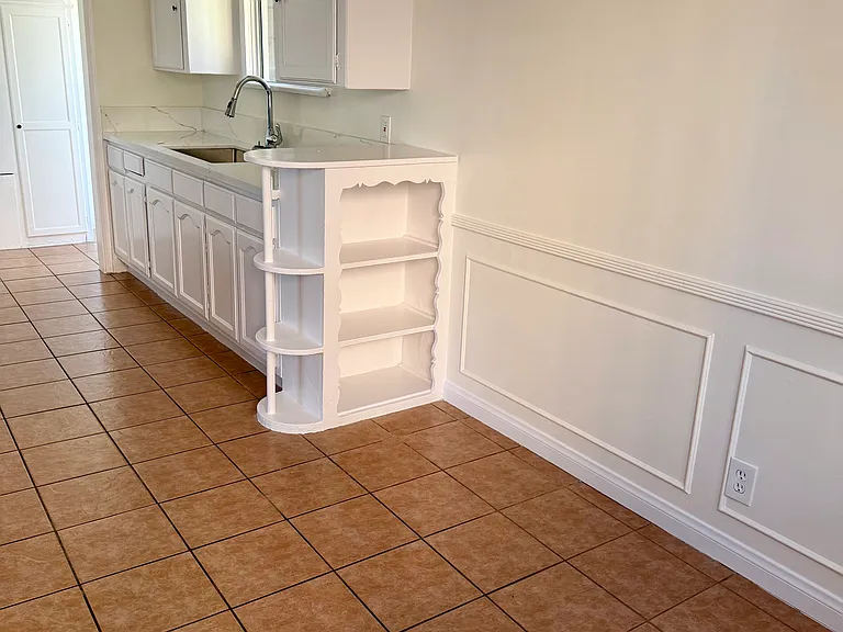Looking towards the kitchen from dining room.