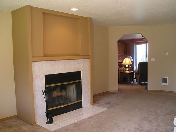 Living Room with Wood Burning Fireplace