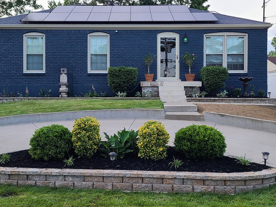 Custom-made exterior cedar wood shutters now installed. Updated photo coming soon.